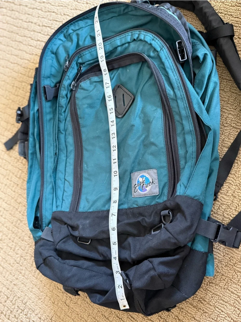 Teal and Black Vintage Eagle Creek Backpack with a day pack attached.